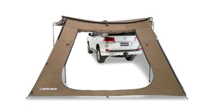 Paroi/mur trapézoïdale avec Porte - Auvent Batwing Compact RHINORACK sur Xperts4x4 Accessoires 4x4 Off-Road
