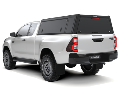 Hardtop Alu-Cab "Guard" pour Toyota Hilux Revo 2016+ Extra Cab, en aluminium, vue extérieure avec fenêtres et portes.
