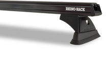 Kit de 2 barres de toit noires RHINO-RACK pour Volkswagen Caddy 2010-2021, de 1250 mm, robuste et adaptée au chargement.