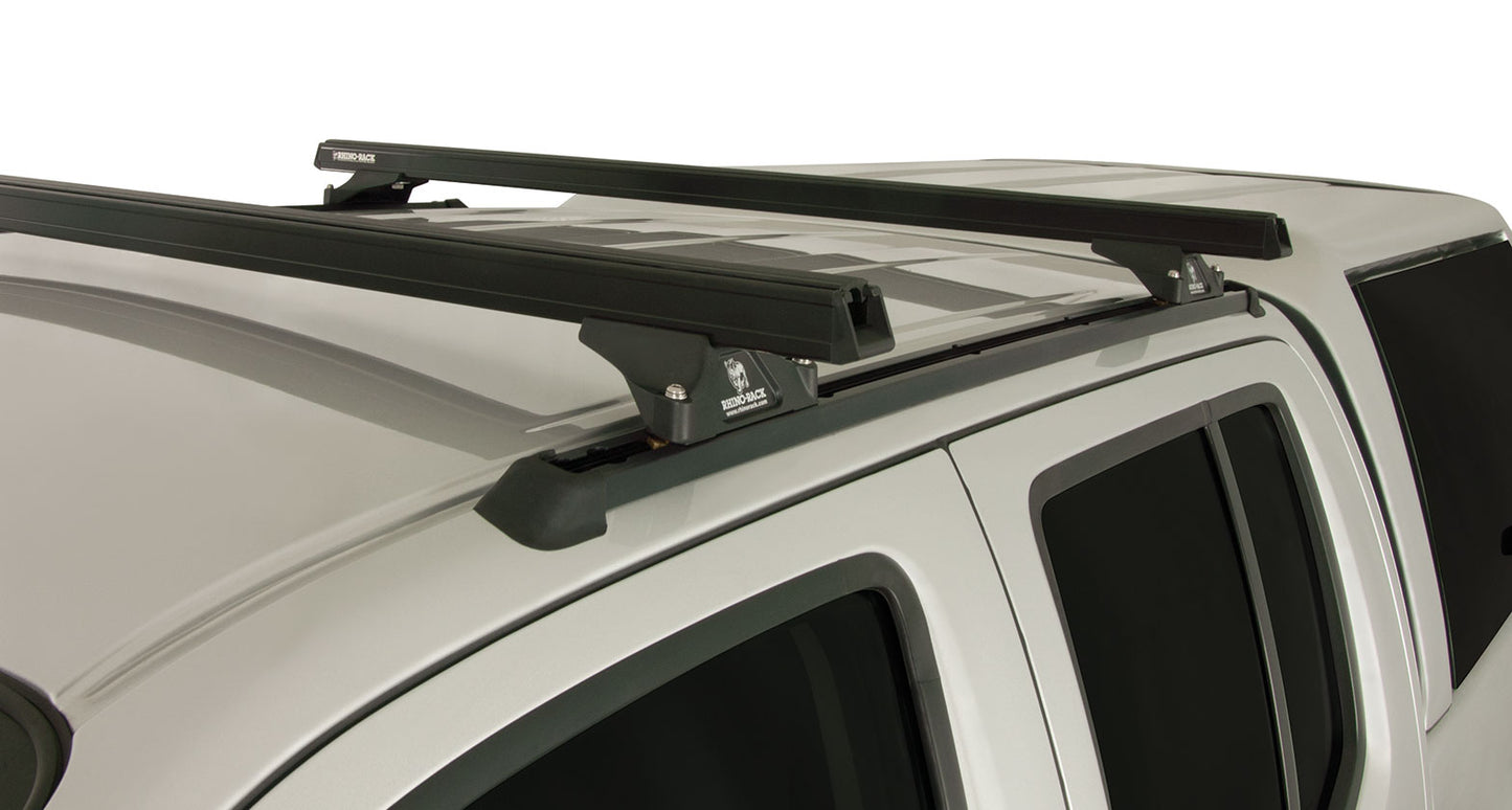 Kit 2 barres de toit noire 1375mm Heavy Duty RLTP Trackmount Nissan Navara D40 2005-2015 - RHINO-RACK sur Xperts4x4 Accessoires 4x4 Off-Road