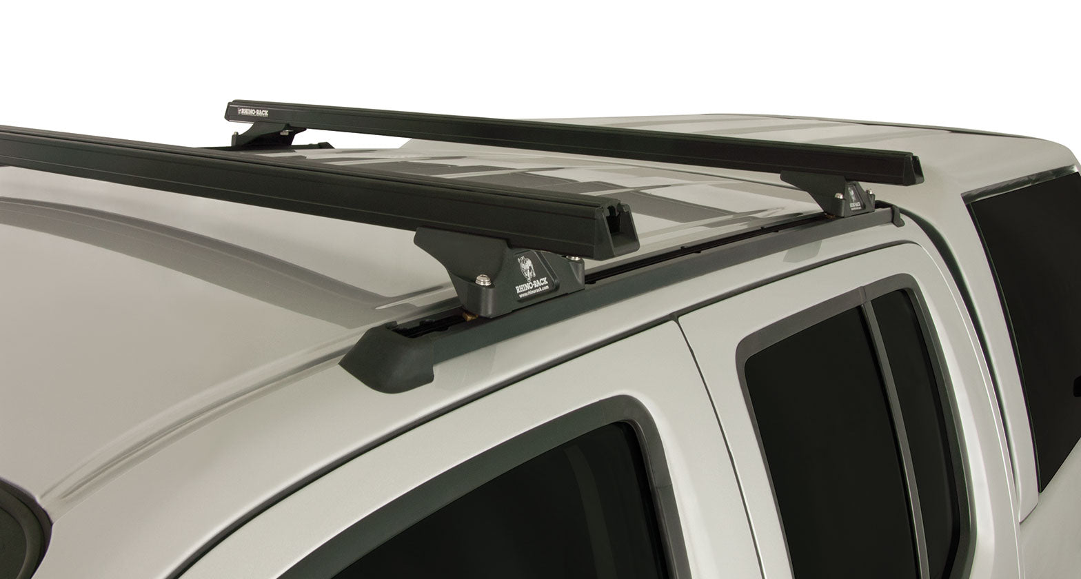Kit 2 barres de toit noire 1375mm Heavy Duty RLTP Trackmount Nissan Navara D40 2005-2015 - RHINO-RACK sur Xperts4x4 Accessoires 4x4 Off-Road