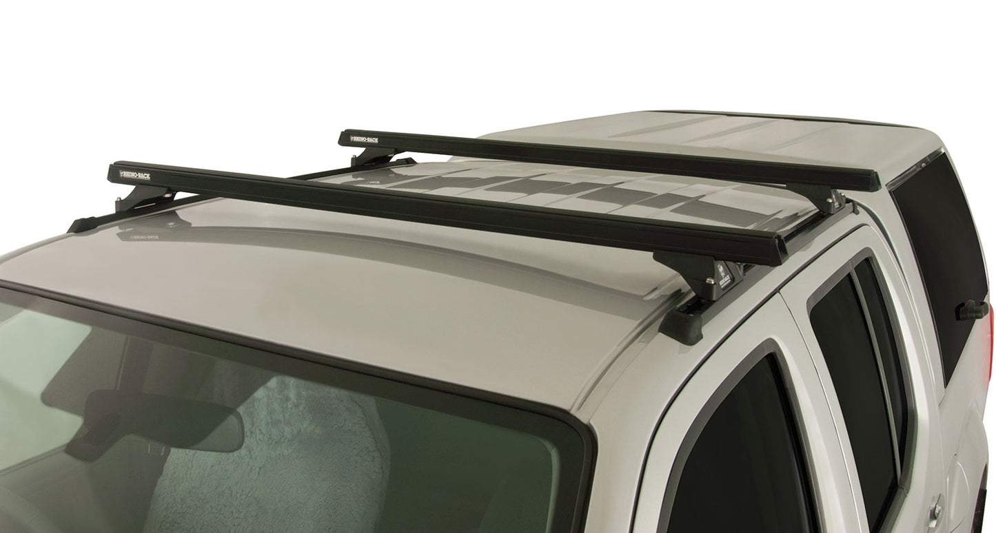 Kit 2 barres de toit noire 1375mm Heavy Duty RLTP Trackmount Nissan Navara D40 2005-2015 - RHINO-RACK sur Xperts4x4 Accessoires 4x4 Off-Road